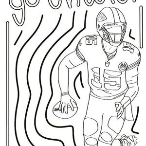 A completed Chiefs helmet coloring page beside crayons