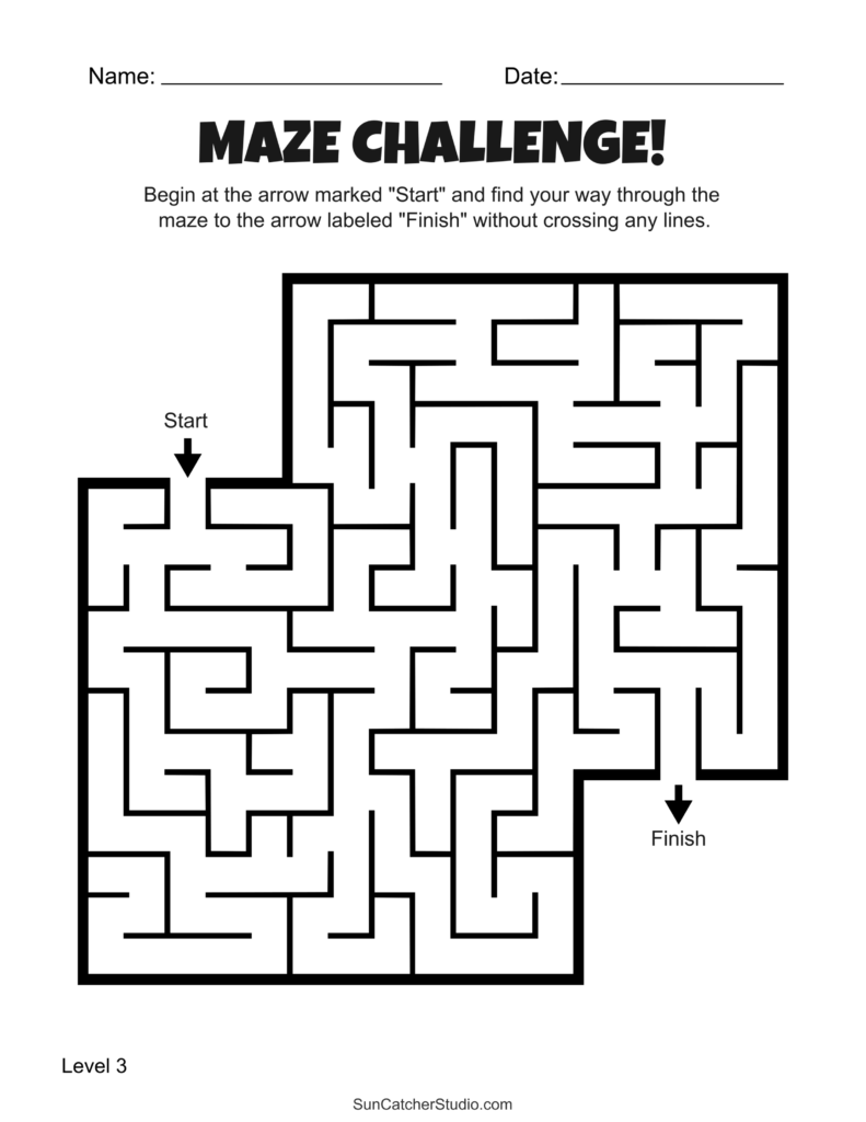 Students solving maze sheets at a classroom desk